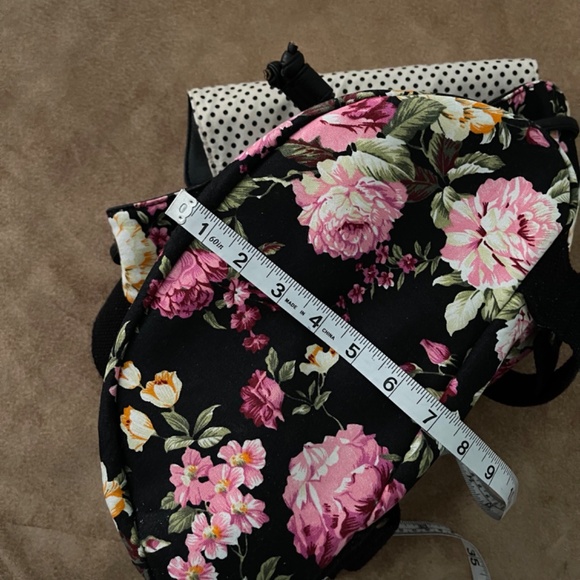 Madden Girl Black Floral Backpack with Polka Dot Interior - Picture 13 of 16
